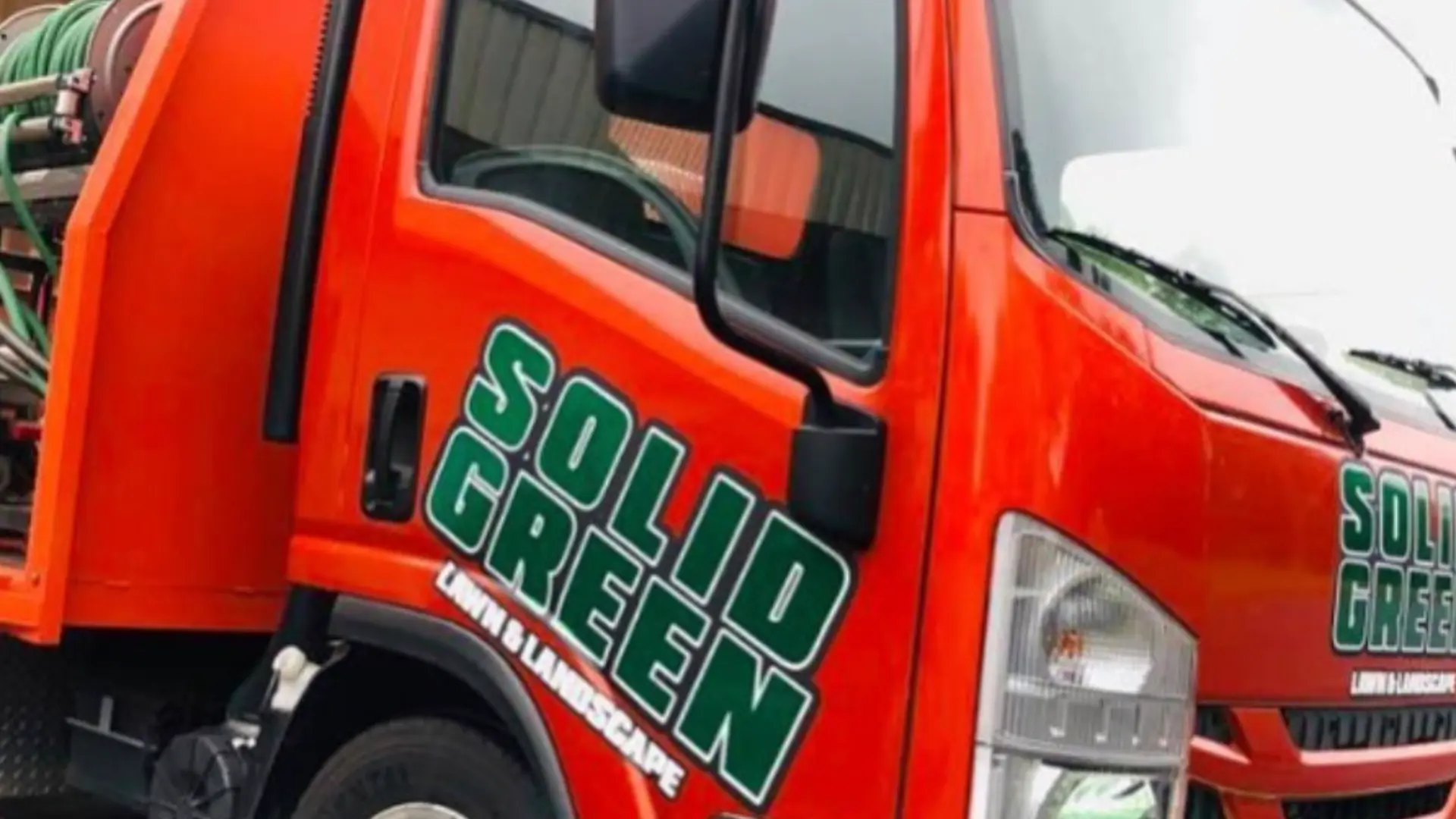 Solid Green Lawn & Landscape Truck