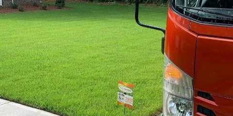 Truck in front of customer's lawn in Monroe, GA.