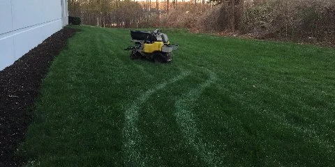 Home in Bethlehem, GA with ZSpray fertilizer machine on lawn.