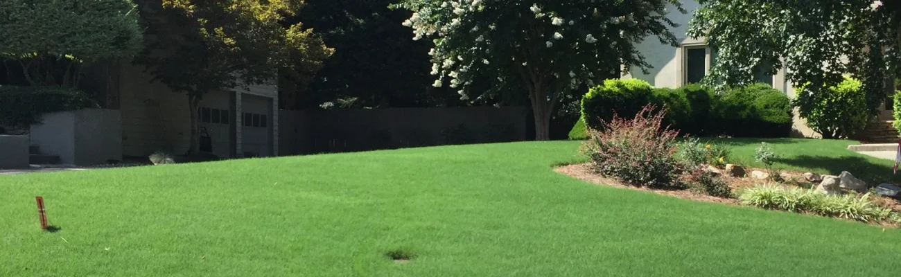 front-yard-with-green-grass-and-plantings