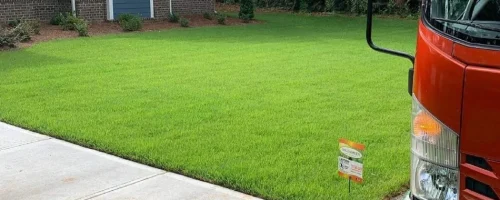 healthy-green-lawn-with-service-truck