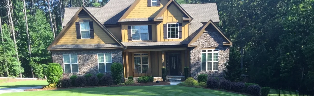 house-behind-wide-green-grass