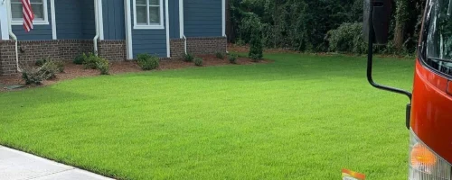how with green lawn and Solid Green treatment truck