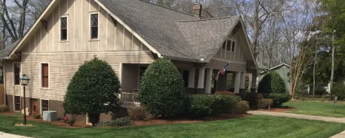 neat-lush-shrubs-on-a-house-beside-lawn